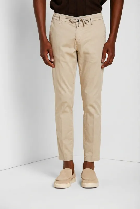 Milano Jogger Travel men's chino pants in technical travel stretch satin extra slim fit sold by Mason's