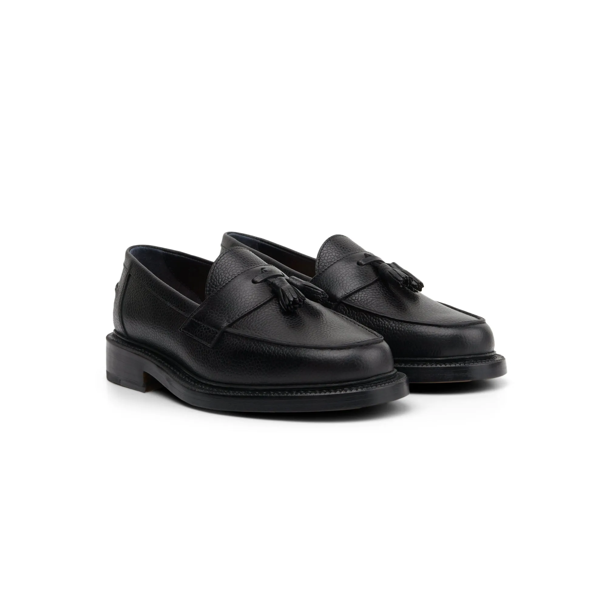 The Clásico Tassel Loafer, Onyx sold by Blackstock & Weber