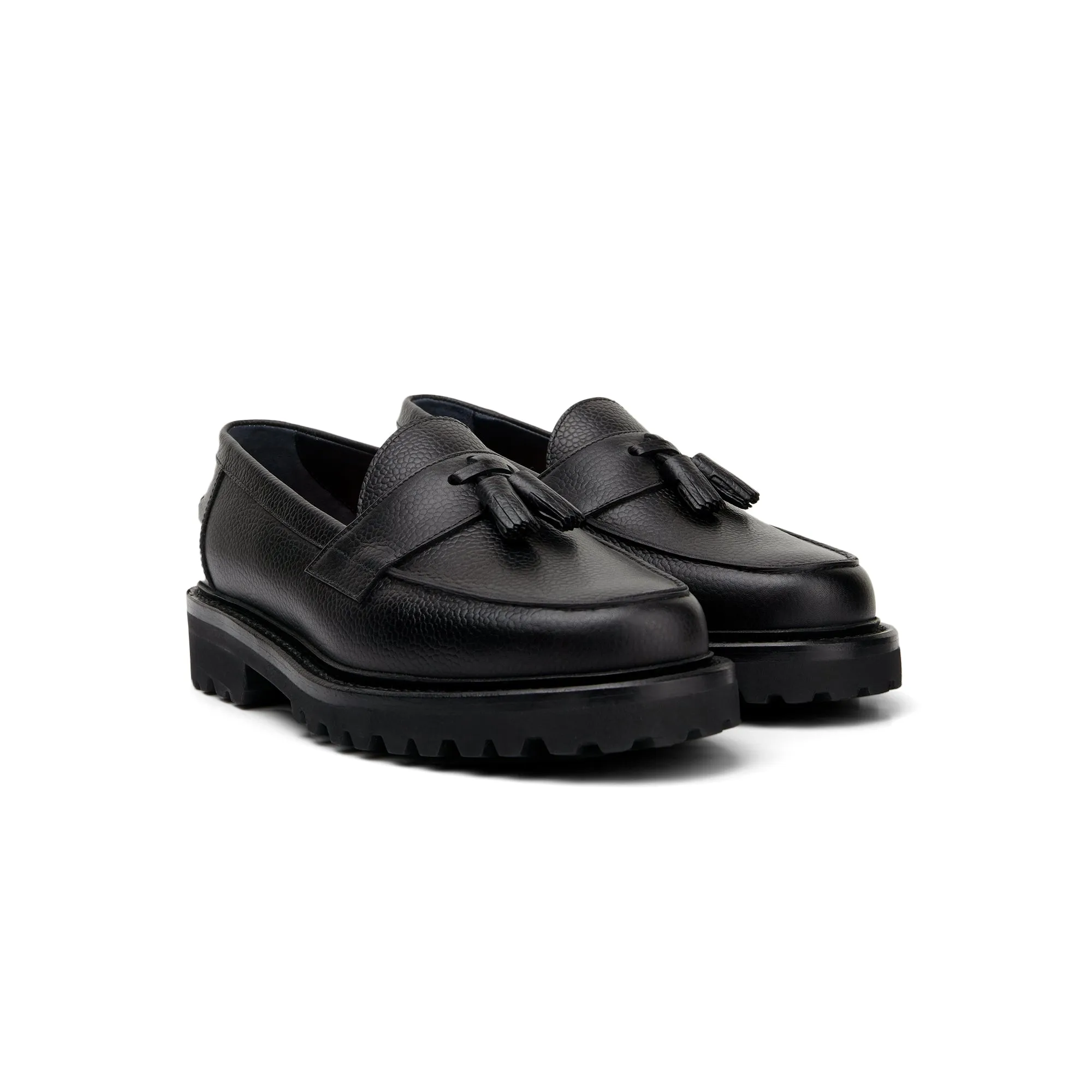 The Clásico Tassel Loafer, Onyx, Lug Sole sold by Blackstock & Weber