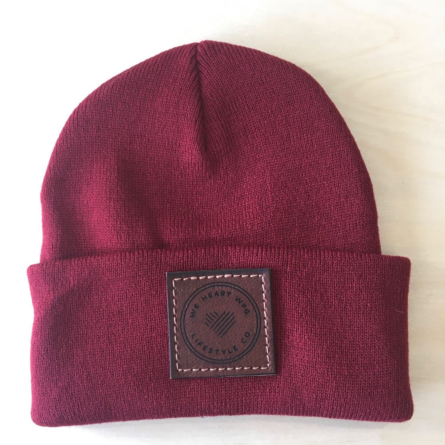 WHW Lifestyle Toque | Chestnut on Maroon sold by We Heart Winnipeg