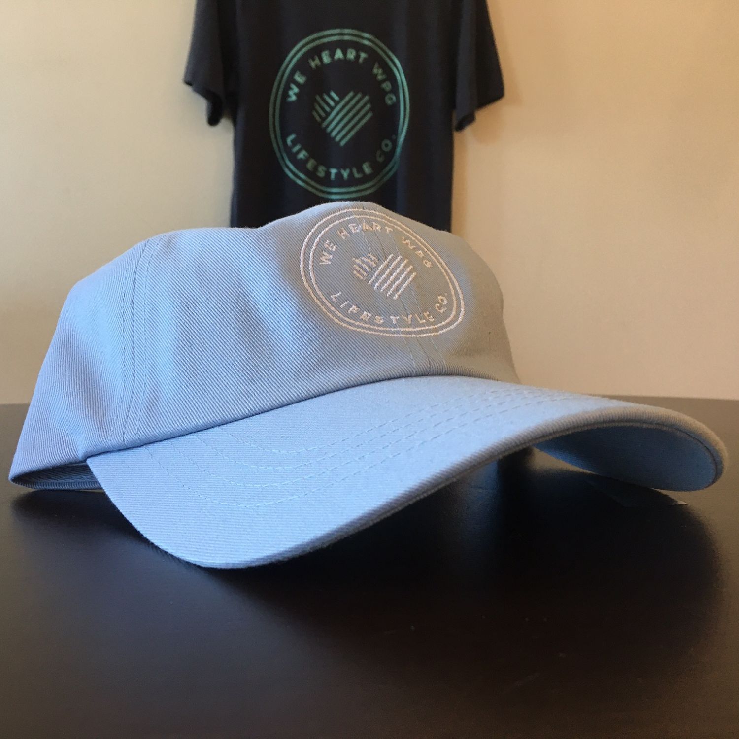 WHW Lifestyle Dad Hat | White on Powder Blue sold by We Heart Winnipeg