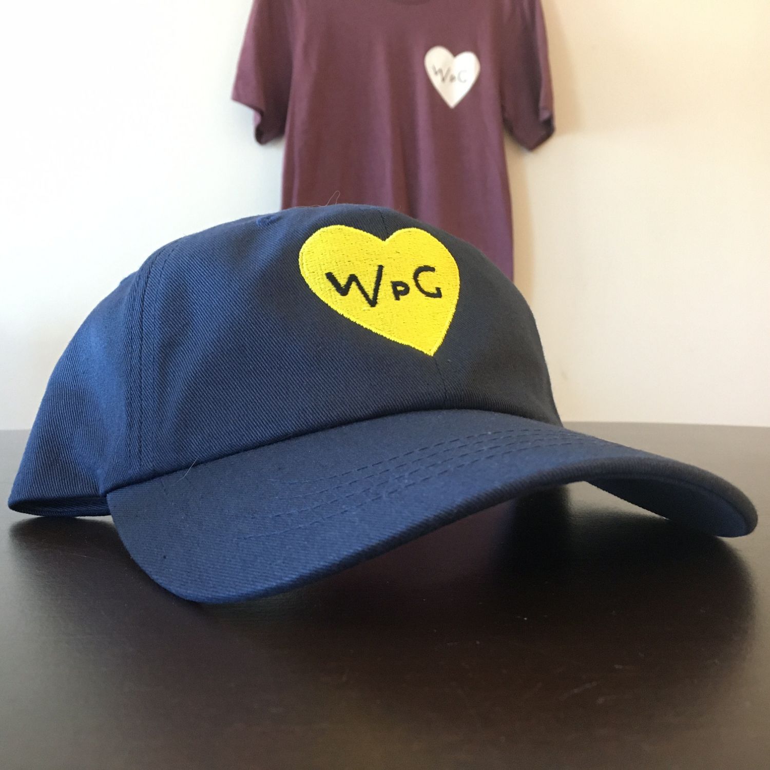 WPG Heart Dad Hat | Yellow on Navy sold by We Heart Winnipeg