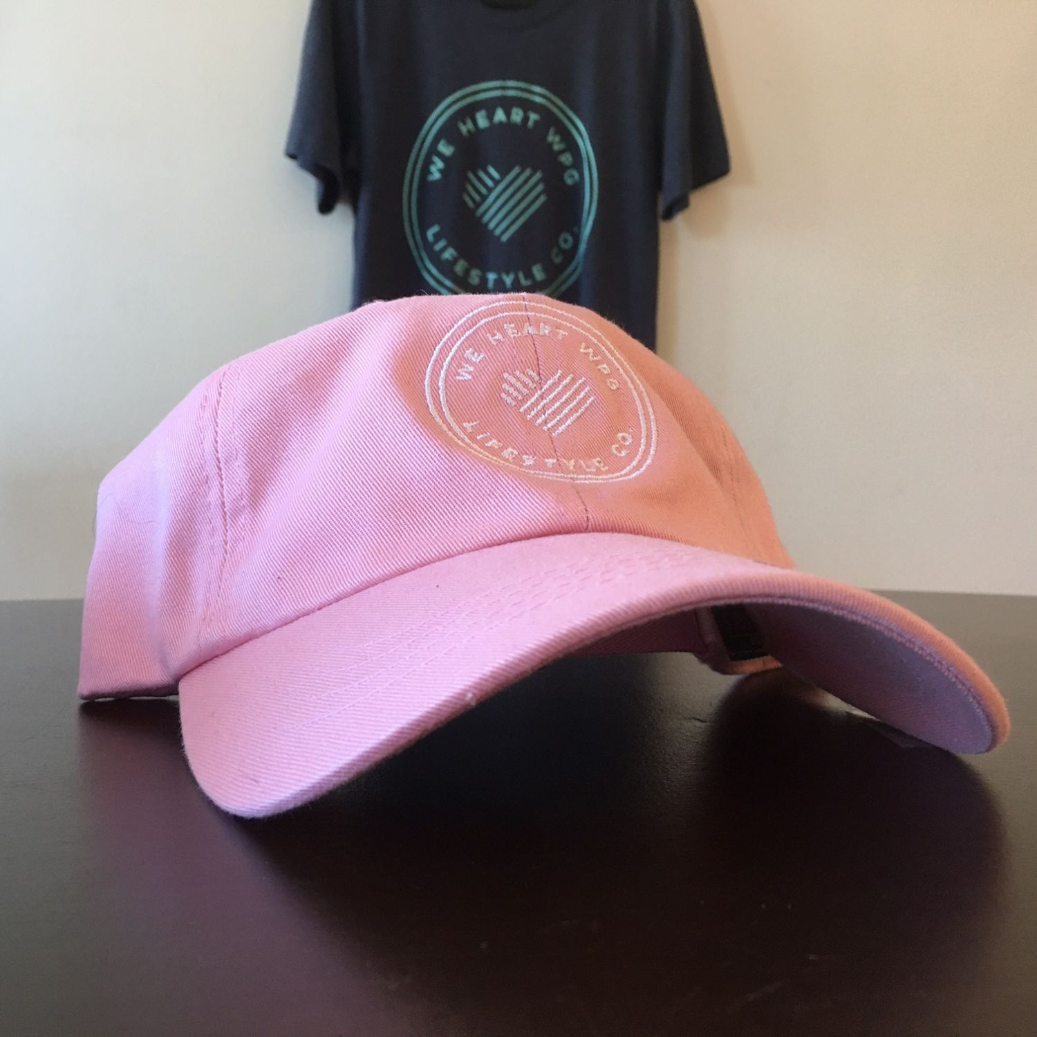 WHW Lifestyle Dad Hat | White on Pink sold by We Heart Winnipeg