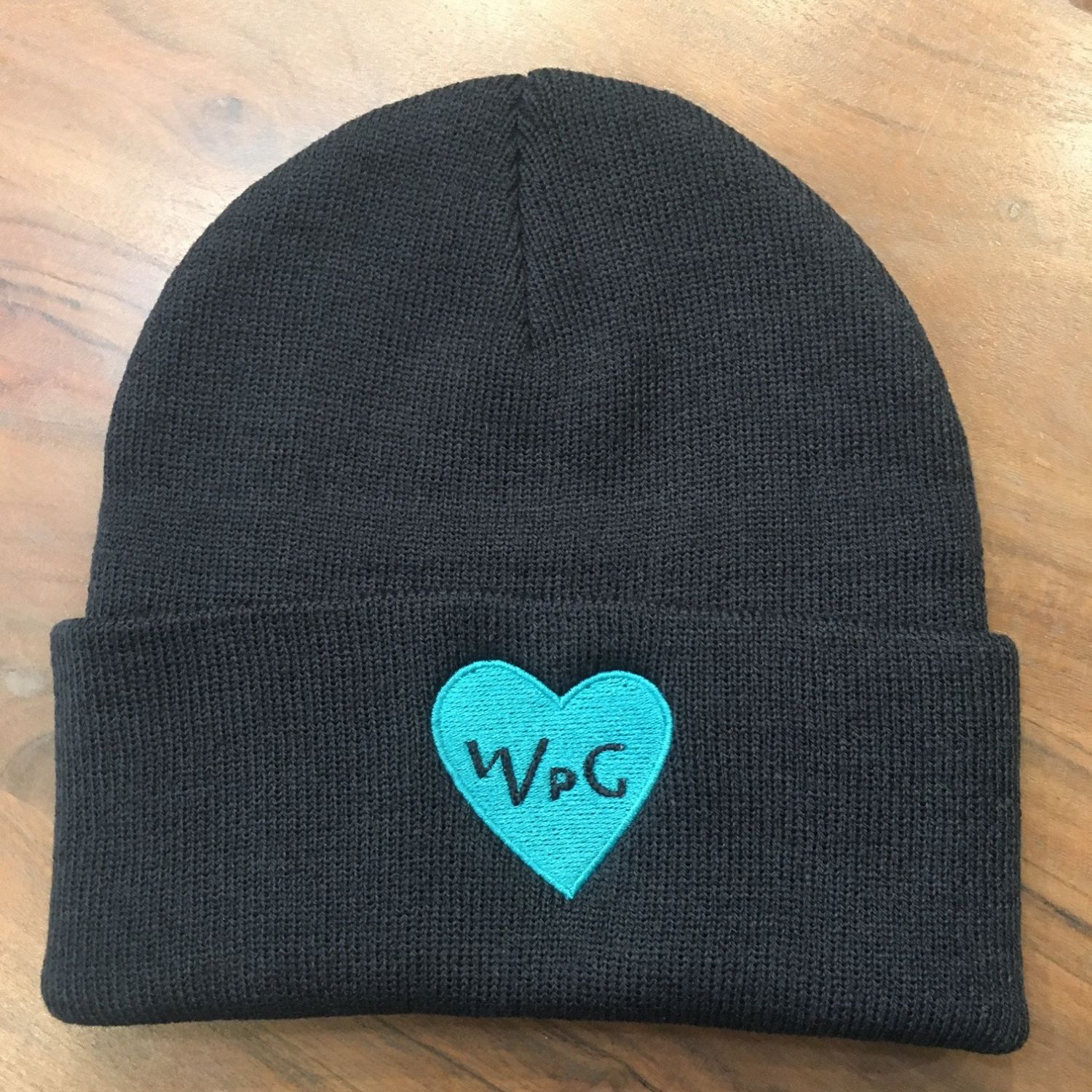 WPG Heart Toque | Teal on Navy sold by We Heart Winnipeg
