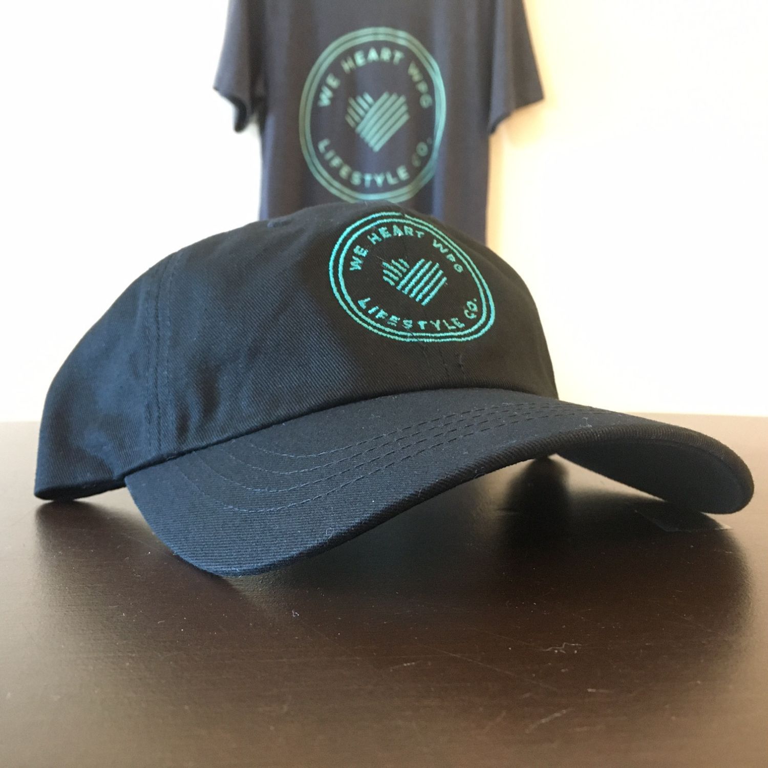 WHW Lifestyle Dad Hat | Teal on Black sold by We Heart Winnipeg