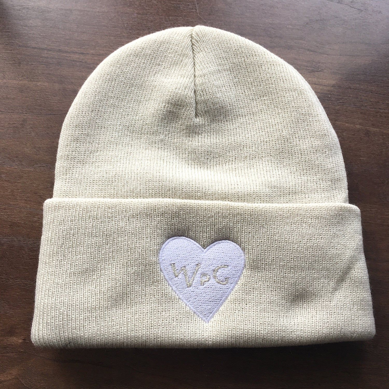 WPG Heart Toque | White on Champagne sold by We Heart Winnipeg