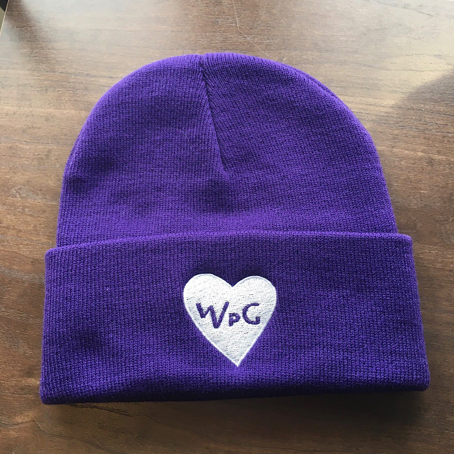 WPG Heart Toque | White on Purple sold by We Heart Winnipeg