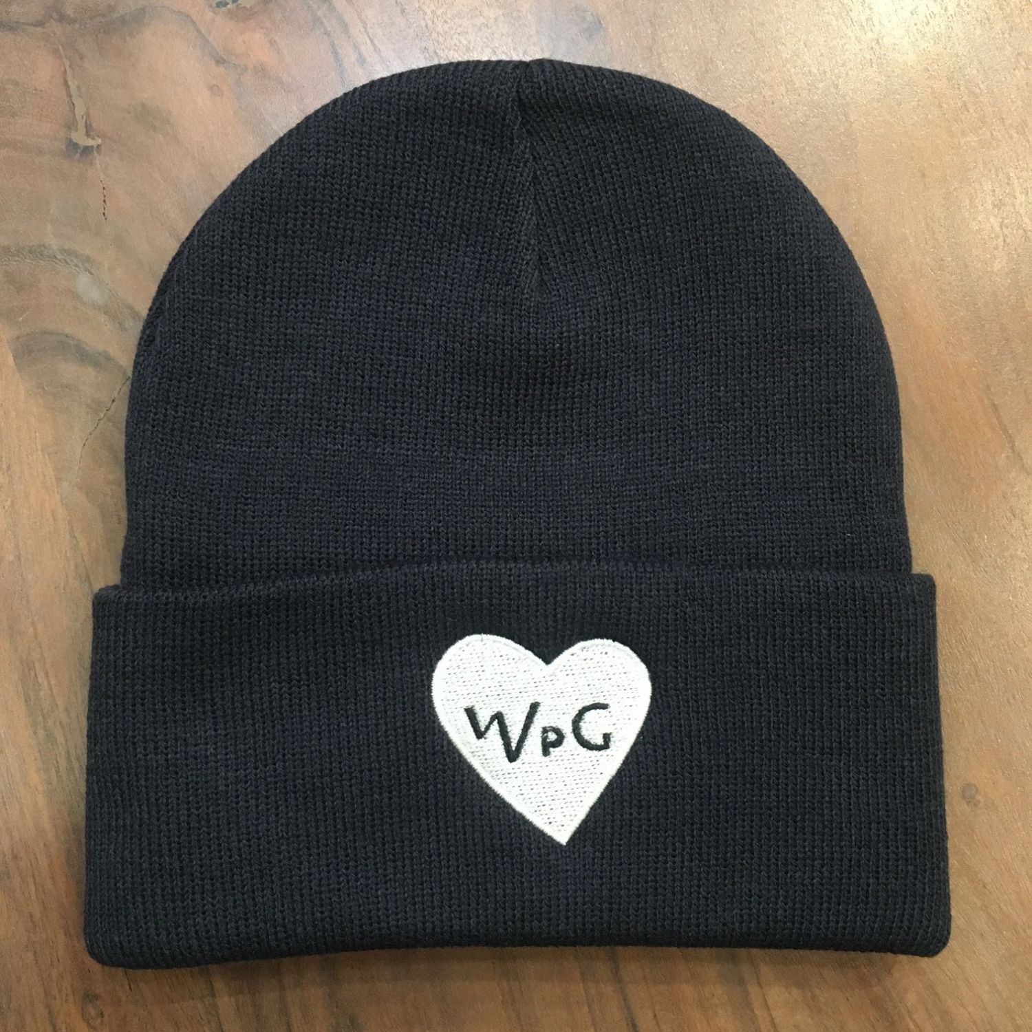 WPG Heart Toque | White on Navy sold by We Heart Winnipeg
