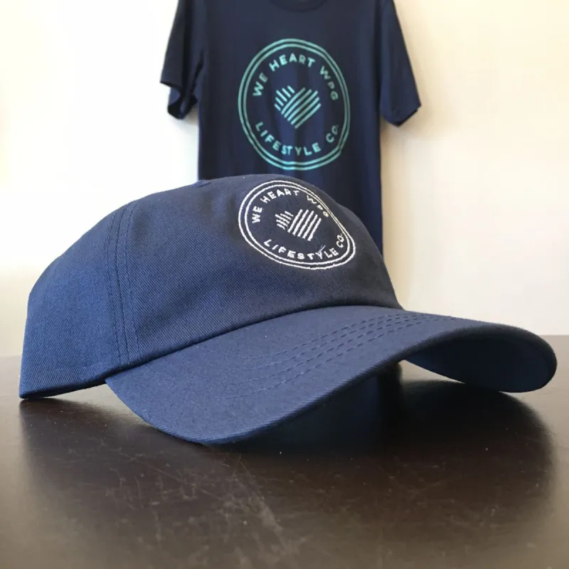 WHW Lifestyle Dad Hat | White on Navy sold by We Heart Winnipeg