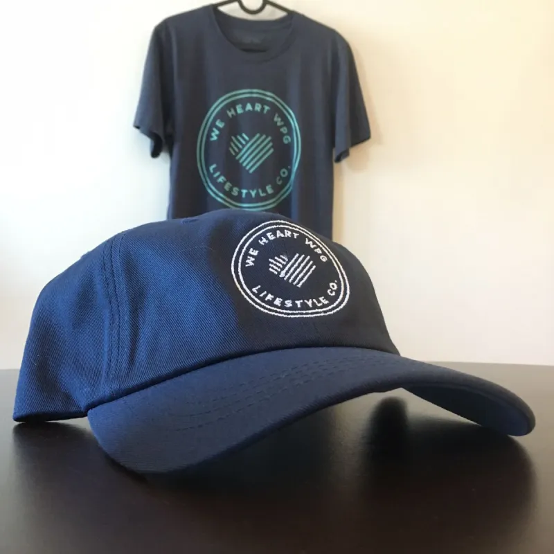 WHW Lifestyle Dad Hat | White on Navy sold by We Heart Winnipeg