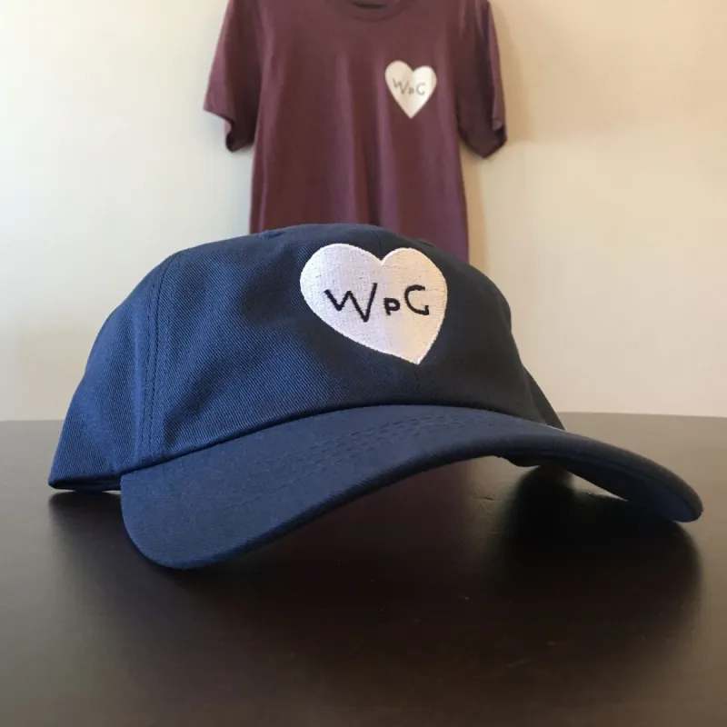 WPG Heart Dad Hat | White on Navy sold by We Heart Winnipeg