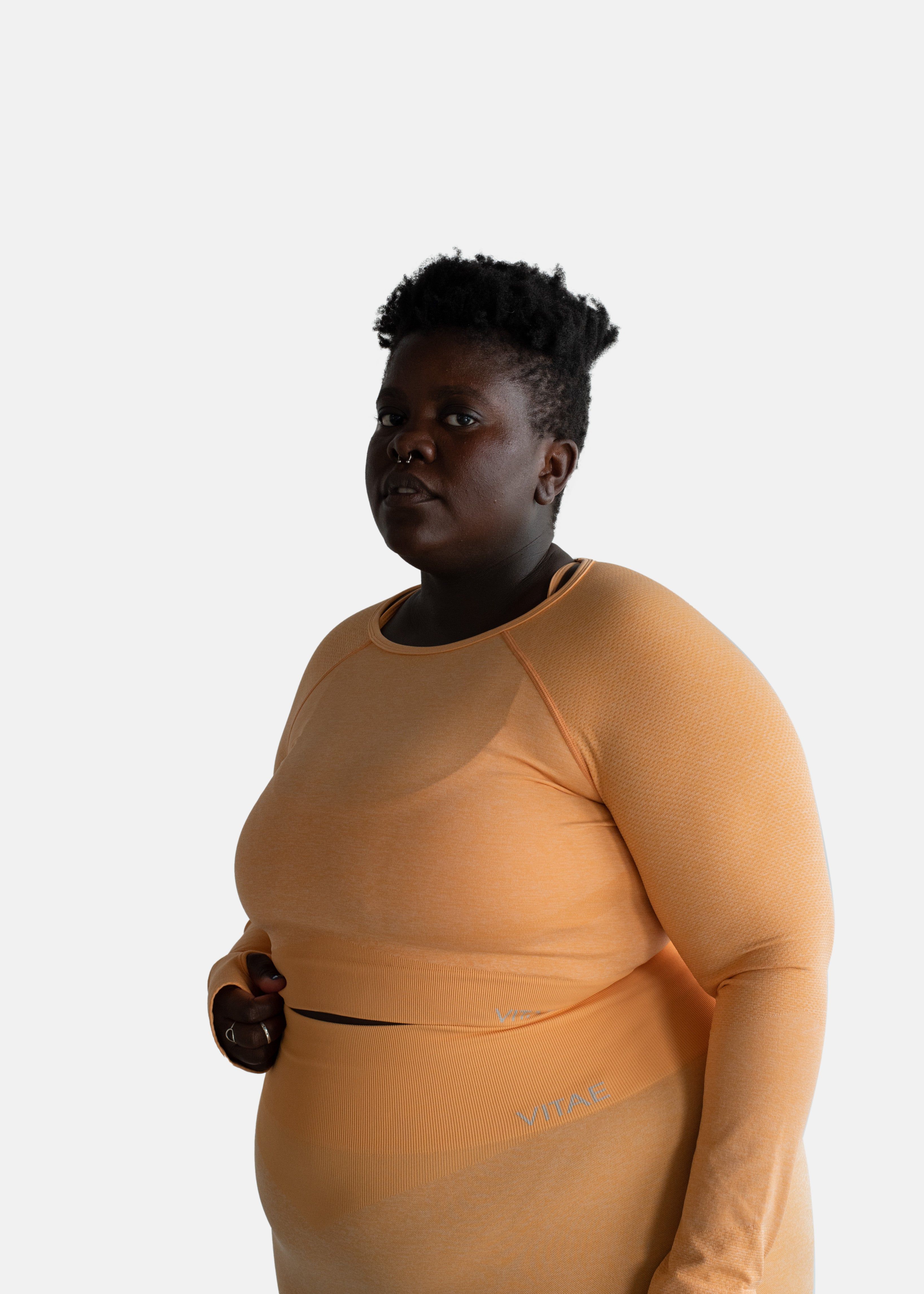 Elevate Long Sleeve Crop Top Tangerine Orange sold by Vitae Apparel product image thumbnail 17