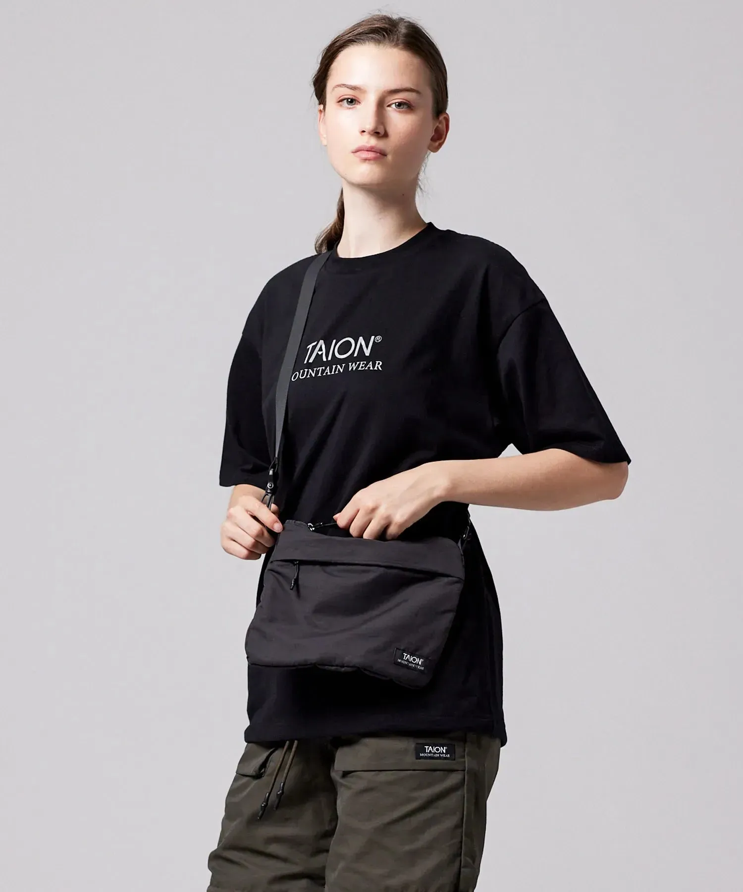 Non Down Mountain Sacoche Bag sold by Taion