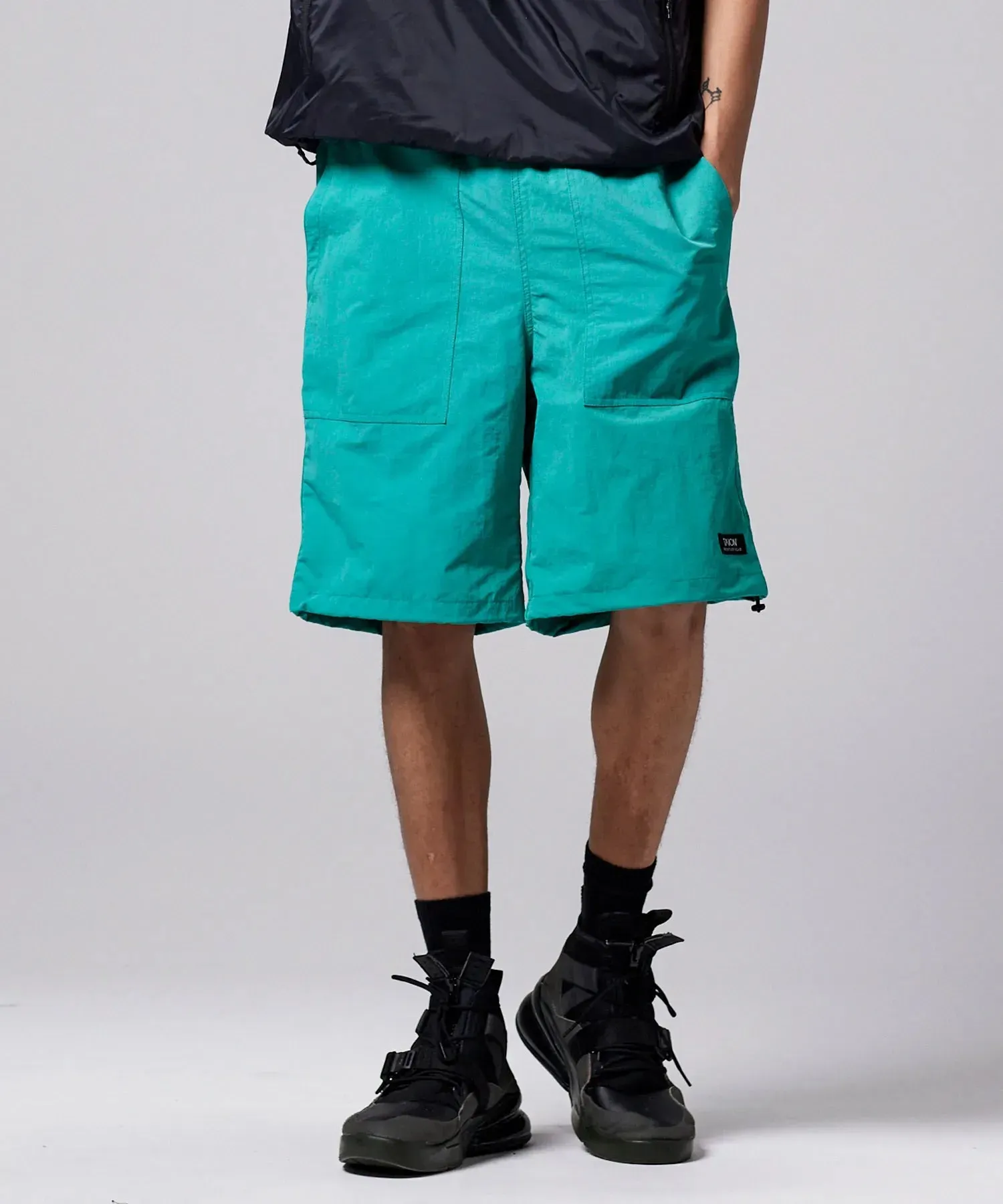 Non Down Mountain W-Pocket Shorts sold by Taion
