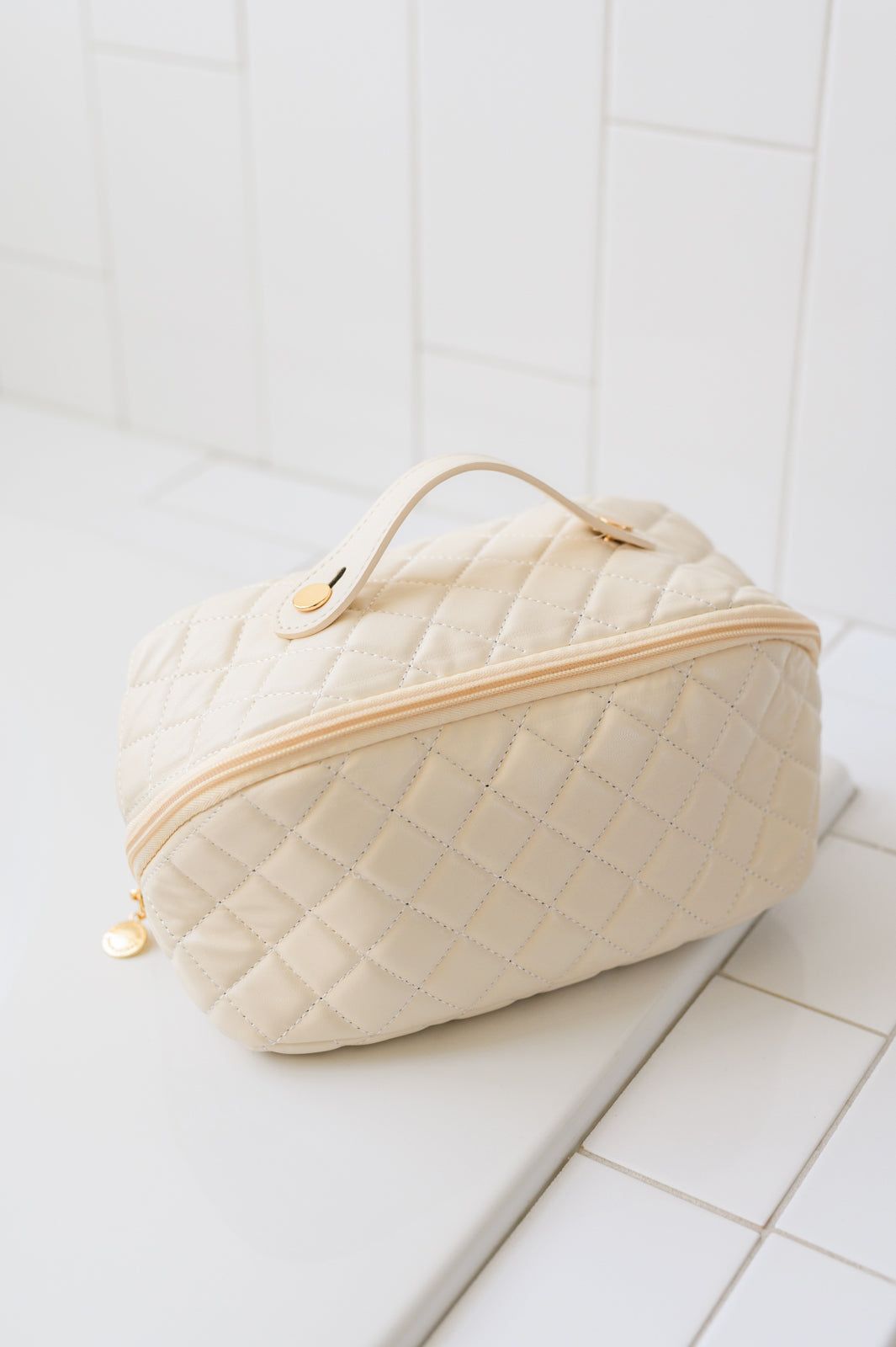 Large Capacity Quilted Makeup Bag in Cream sold by The Dogwood Boutique