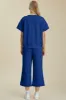 Full Size Texture Round Neck Short Sleeve Top and Wide Leg Pants Set sold by The Dogwood Boutique
