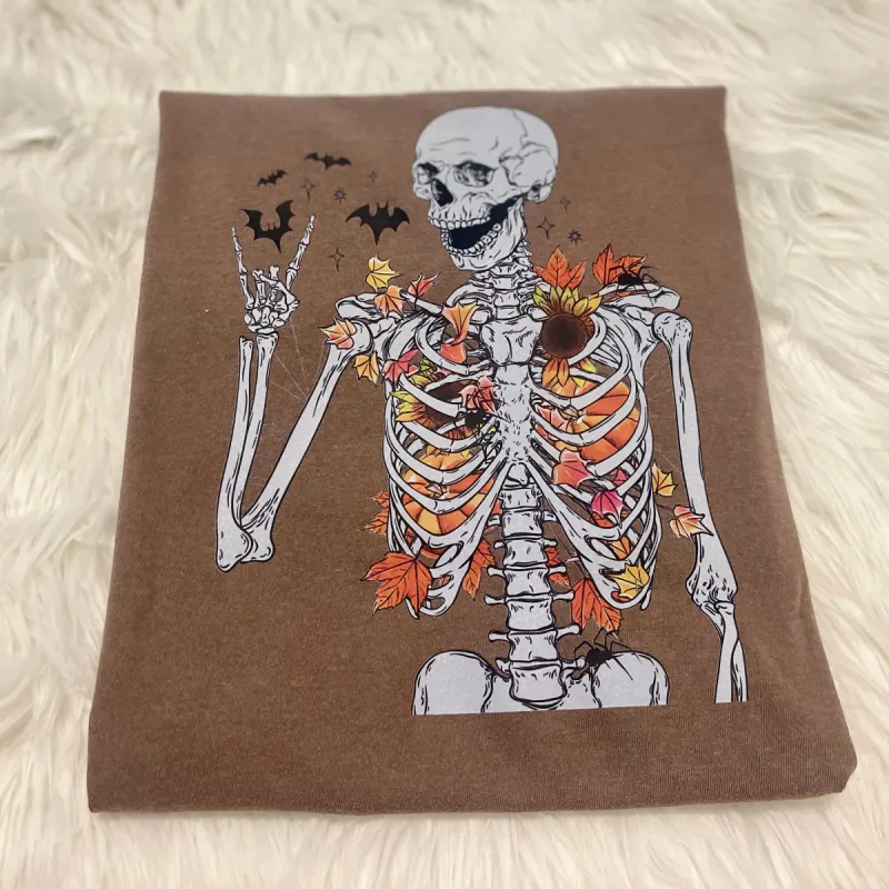 Fall Skeleton Comfort Colors Tee sold by The Dogwood Boutique