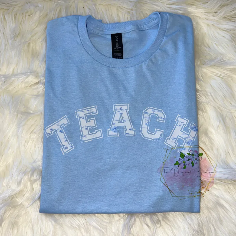 Floral TEACH Teacher Tee Shirt sold by The Dogwood Boutique