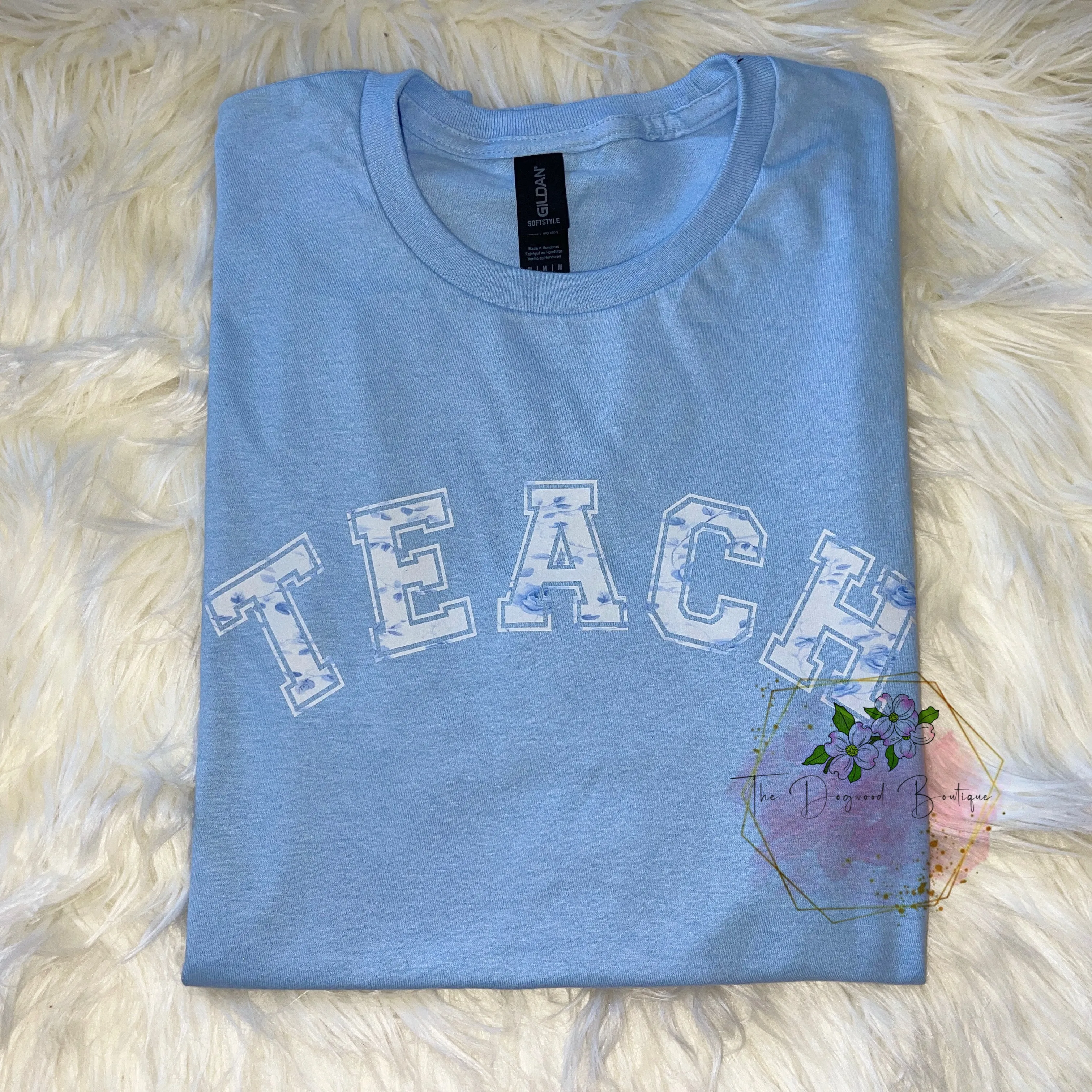 Floral TEACH Teacher Tee Shirt sold by The Dogwood Boutique