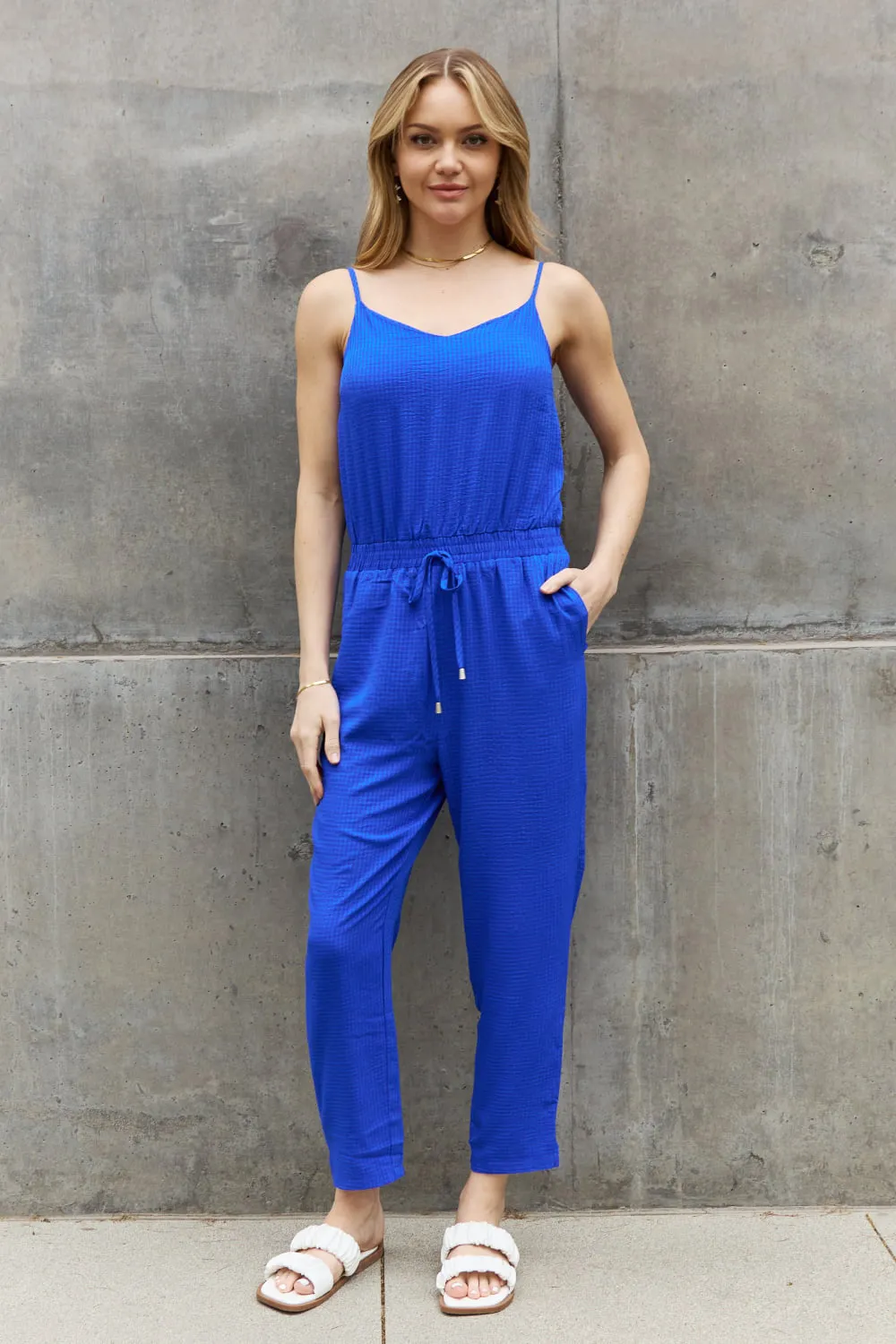 ODDI Full Size Textured Woven Jumpsuit in Royal Blue sold by The Dogwood Boutique
