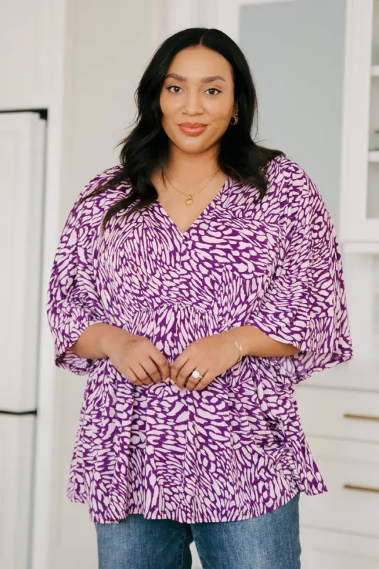 Dearest Dreamer Peplum Top in Painted Purple sold by The Dogwood Boutique
