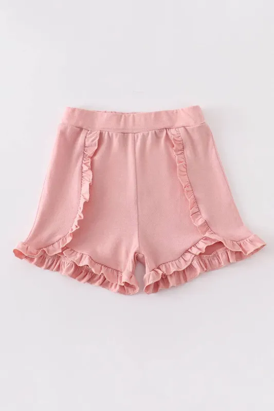 Light pink ruffle girl shorts sold by The Dogwood Boutique