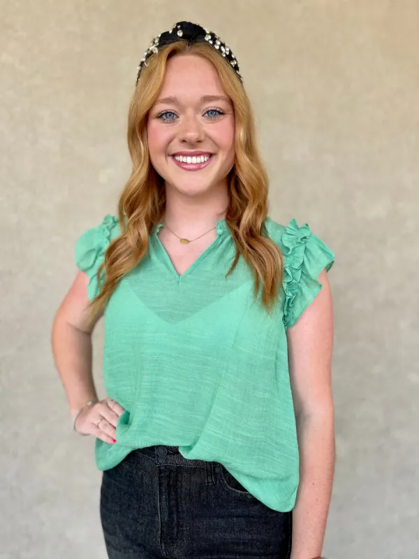 Sage Flutter Sleeve Woven Top sold by The Dogwood Boutique