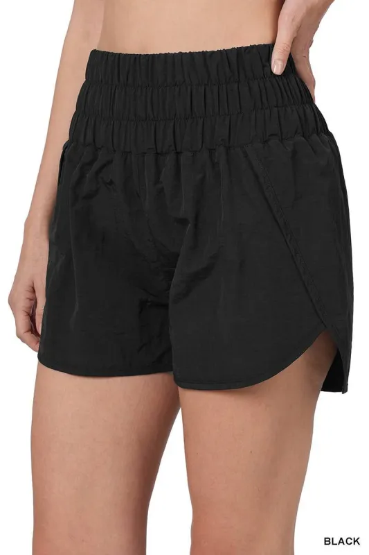 Black Track shorts w/ lining & mesh pocket sold by The Dogwood Boutique