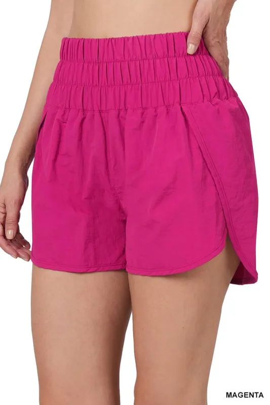 Magenta Track shorts w/ lining & mesh pocket sold by The Dogwood Boutique