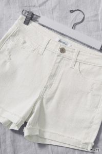 Distressed Cuffed Raw Hem White Denim Shorts sold by The Dogwood Boutique