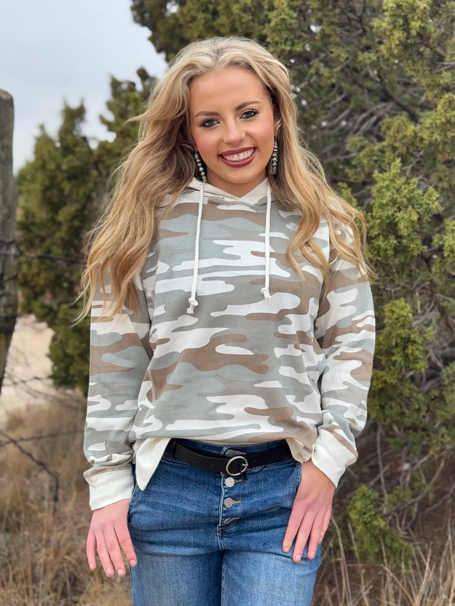 Jess Camo Hooded Sweatshirt sold by The Dogwood Boutique