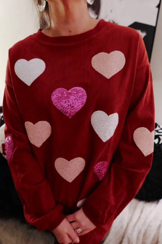 Red Sequin Hearts Corded Crew sold by The Dogwood Boutique