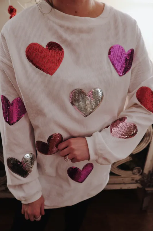 White Sequin Hearts Corded Crew sold by The Dogwood Boutique