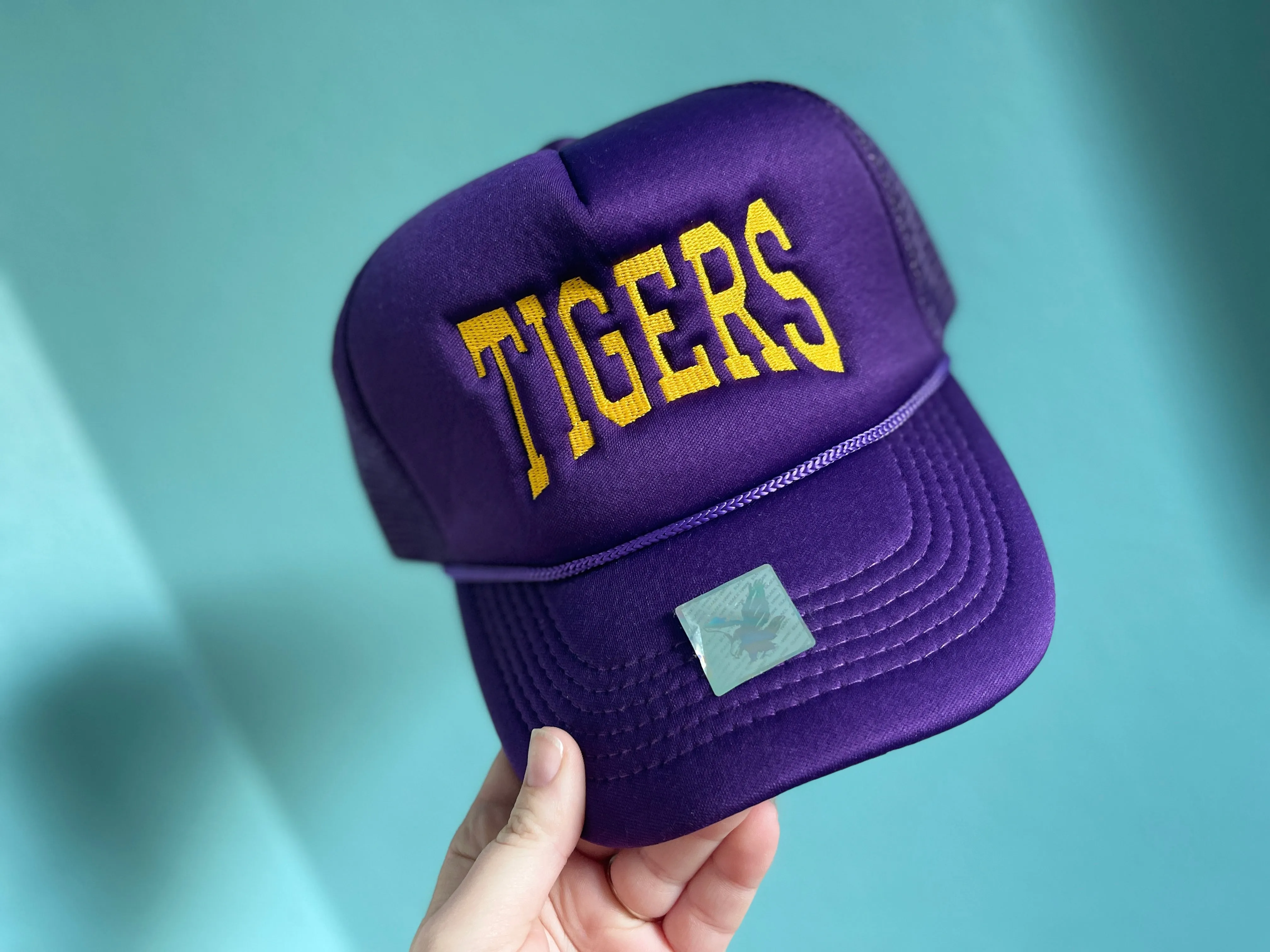 Tigers embroidered foam trucker hat sold by The Dogwood Boutique