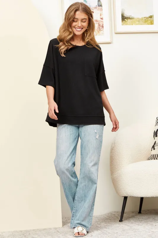 Black Half Sleeve Relaxed Pocket Blouse sold by The Dogwood Boutique
