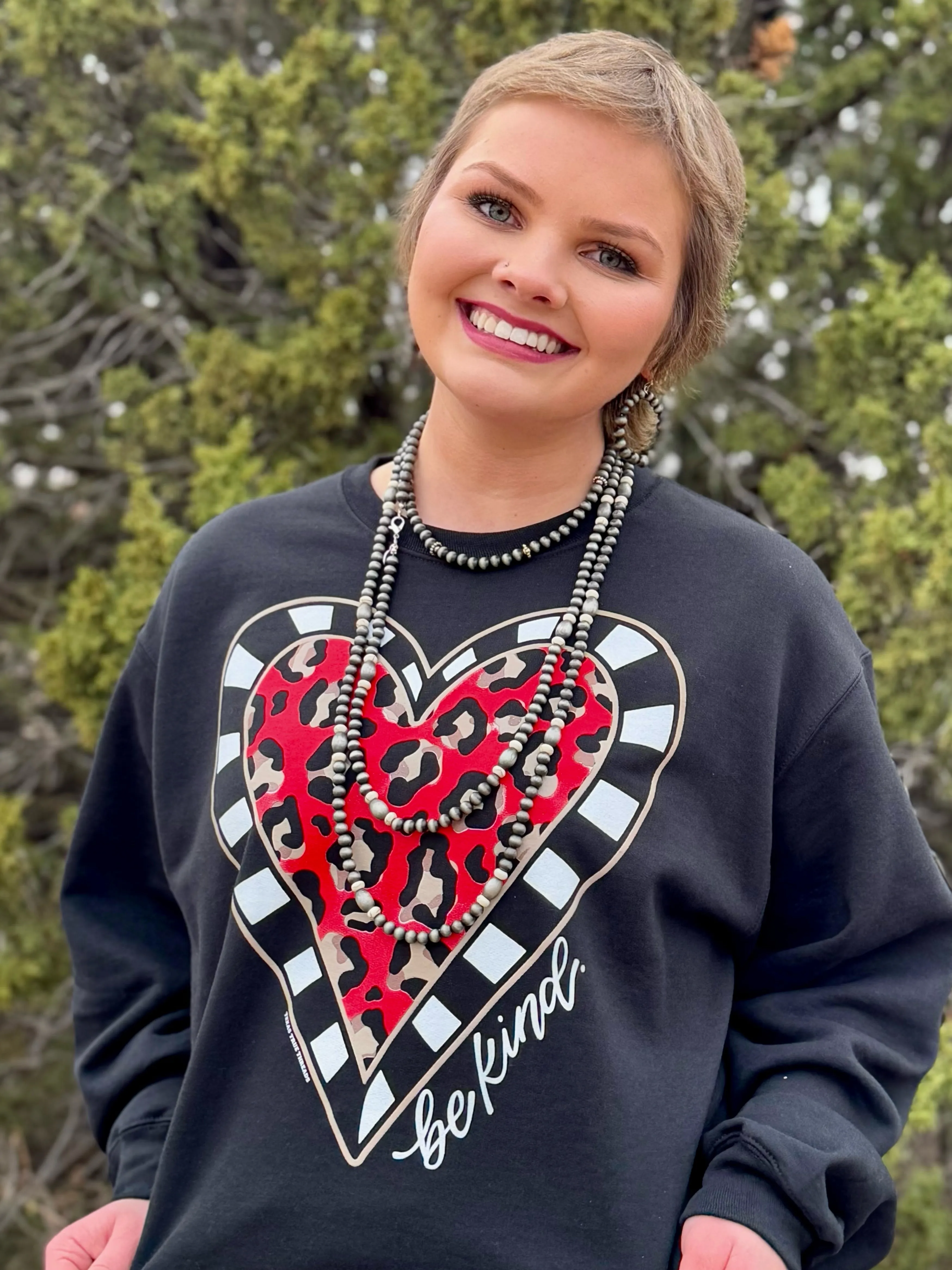 Be Kind Leopard Heart Long Sleeve Tee & Sweatshirt sold by The Dogwood Boutique
