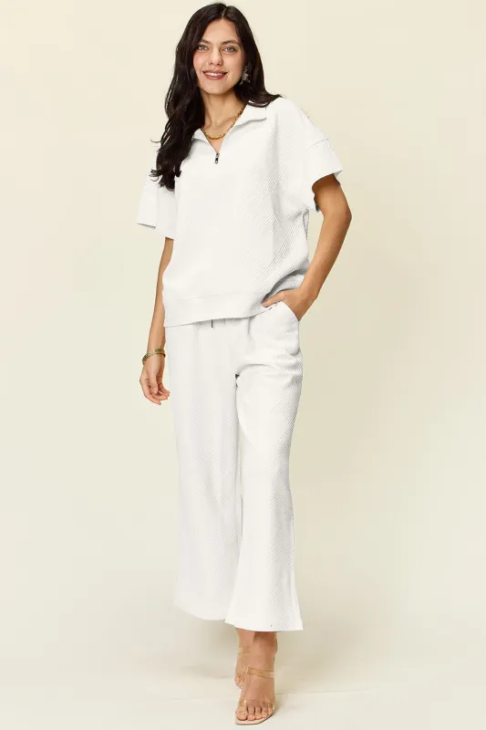 Double Take Full Size Texture Half Zip Short Sleeve Top and Pants Set sold by The Dogwood Boutique