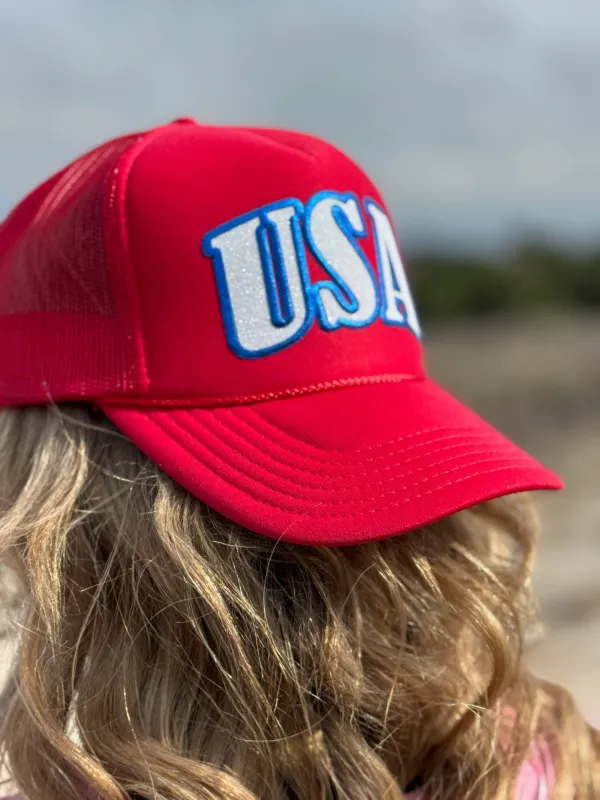 USA in Glitter & Puff Foam Trucker Cap sold by The Dogwood Boutique