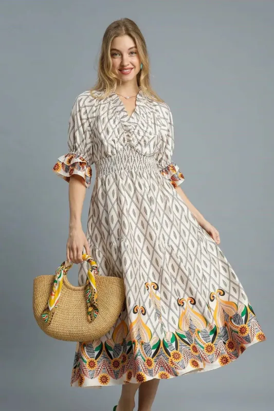 Umgee Printed Smocked Waist Flounce Sleeve Midi Dress sold by The Dogwood Boutique