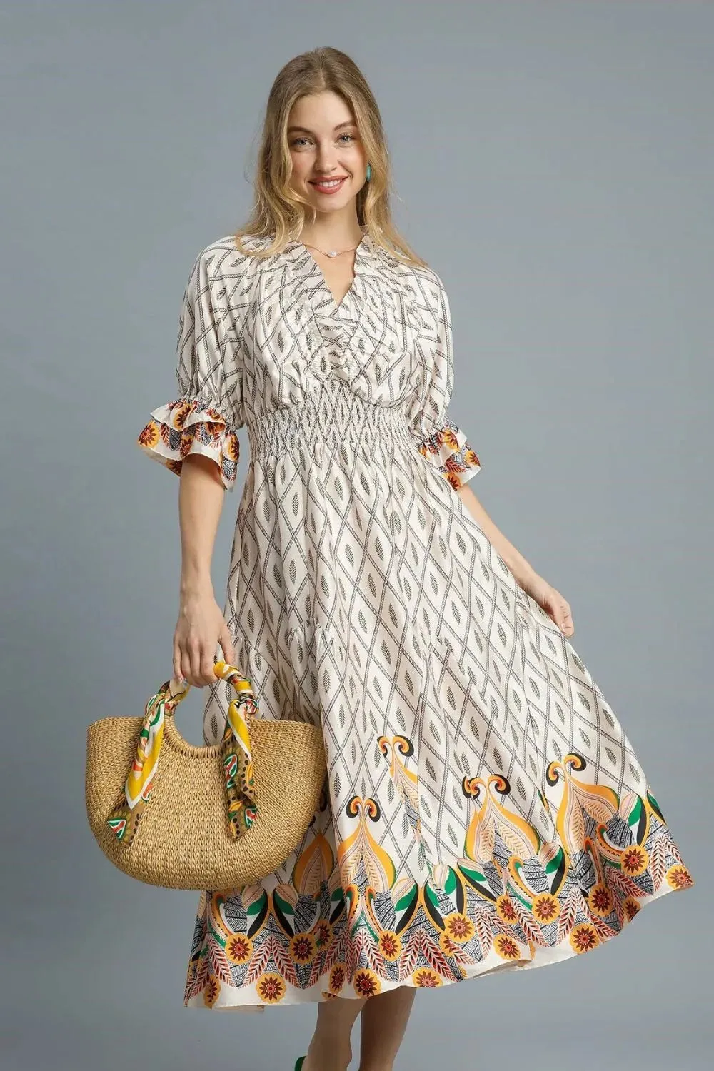 Umgee Printed Smocked Waist Flounce Sleeve Midi Dress sold by The Dogwood Boutique