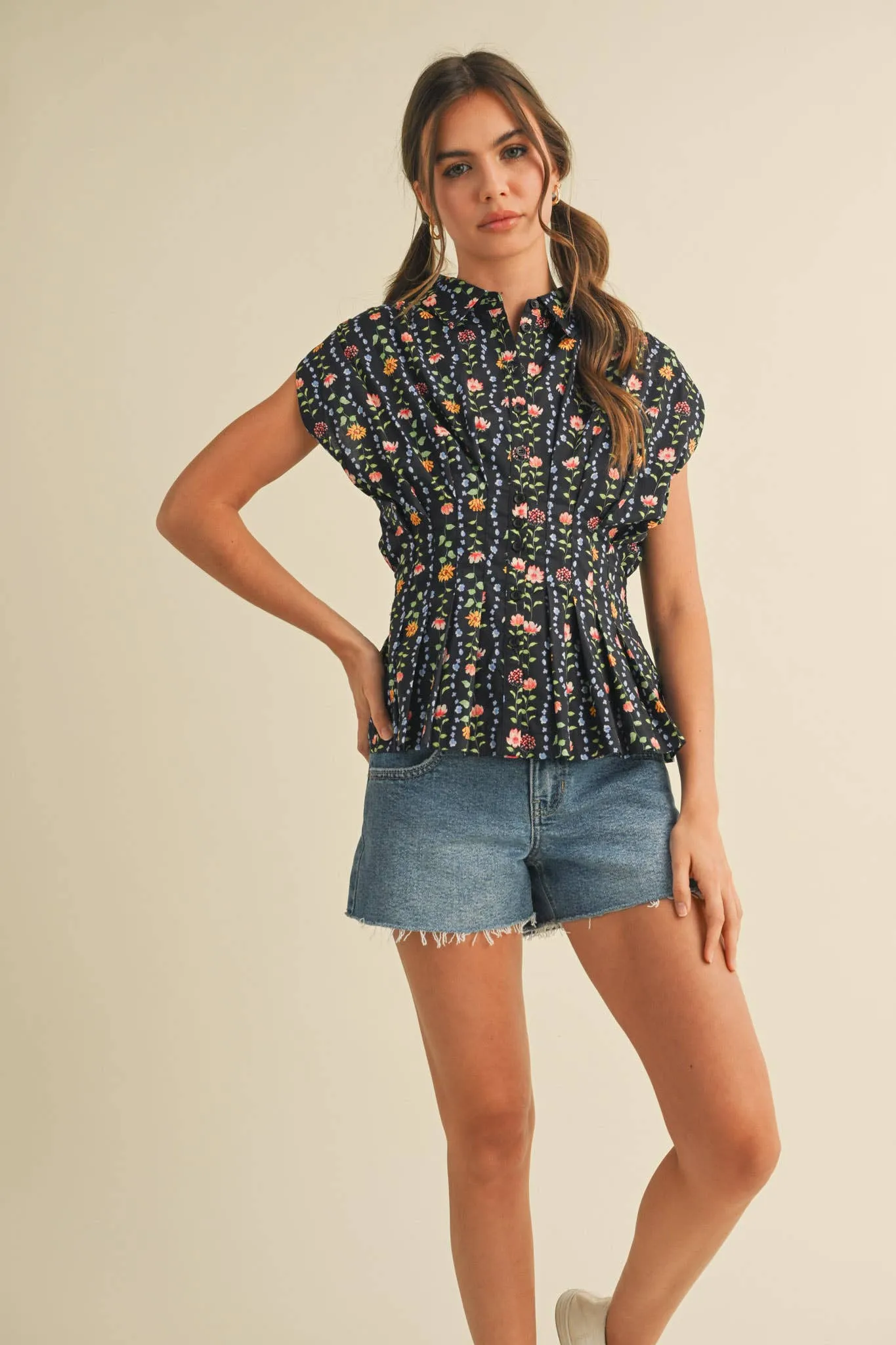 Black Button Down Pleated Waist Peplum Top sold by The Dogwood Boutique