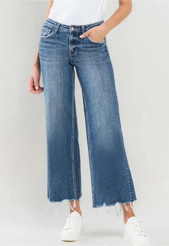 Mid Rise Raw Hem Wide Leg Jeans sold by The Dogwood Boutique
