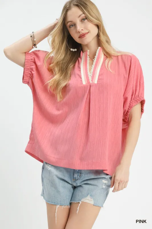 Umgee Textured V-Neck Blouse sold by The Dogwood Boutique