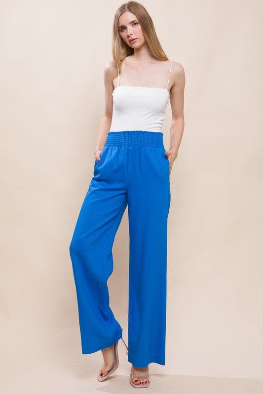Blue Smocked Waist Linen Pants sold by The Dogwood Boutique