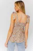 Sleeveless Ruffle Bottom Top sold by The Dogwood Boutique