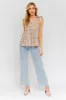 Sleeveless Ruffle Bottom Top sold by The Dogwood Boutique