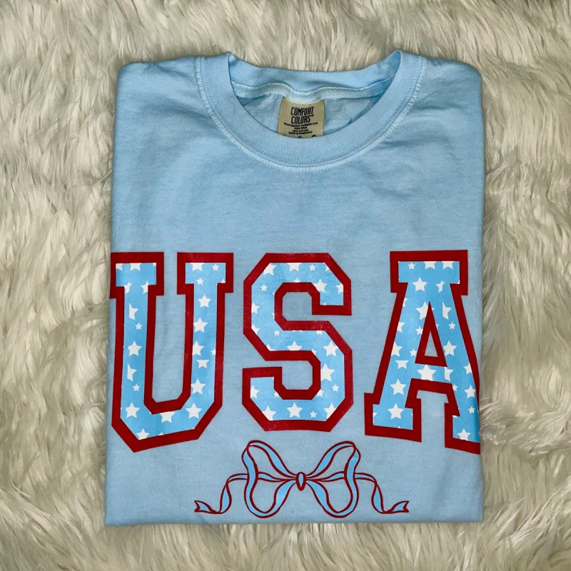 USA Coquette Comfort Colors Tee sold by The Dogwood Boutique