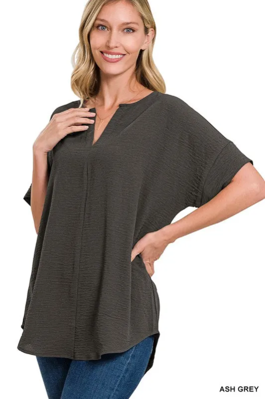 Woven Airflow Split Neck Short Sleeve Top sold by The Dogwood Boutique