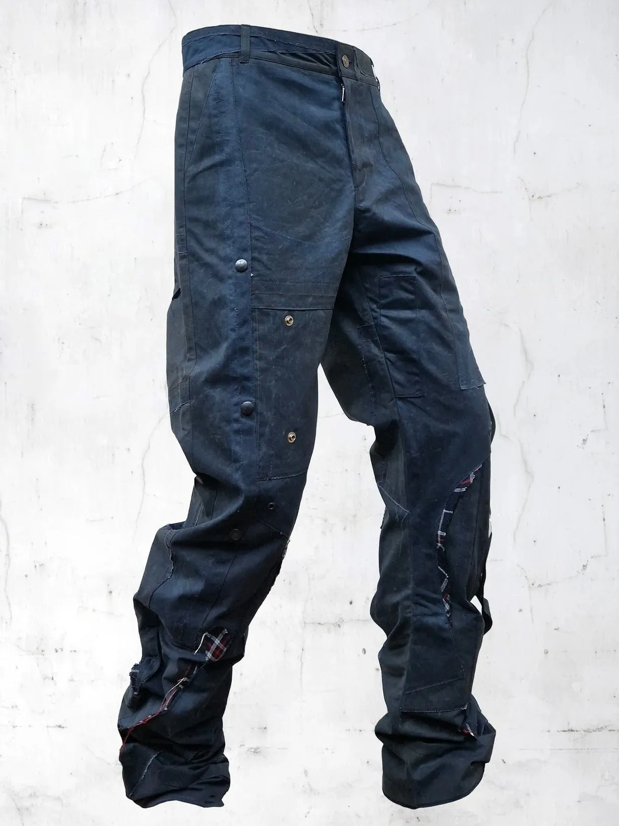 C-SHAPE WAXED PATCHWORK PANTS BLUE sold by APOC