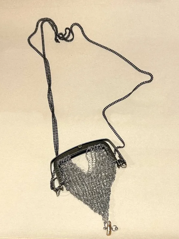“Open my heart” knitted metal pouch made by APOC